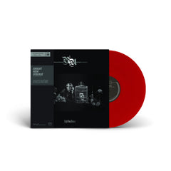Bright New Disease vinyl record with dark album cover art and red translucent disc on white background