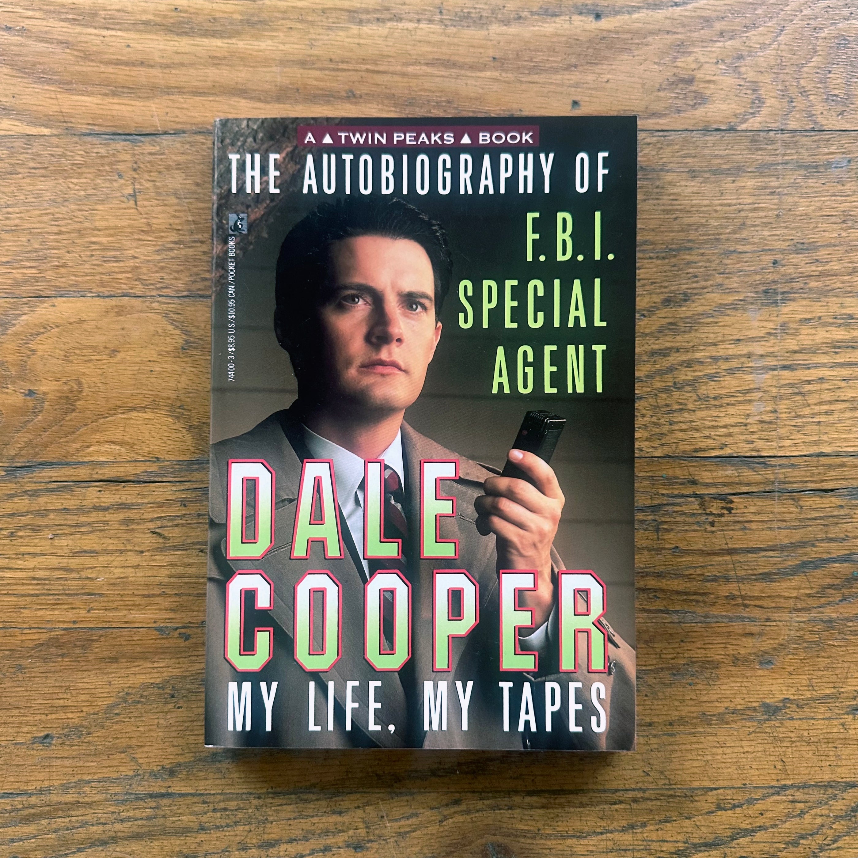 The Autobiography of FBI Special Agent Dale Cooper Paperback showing the book cover with Dale Cooper holding a tape recorder