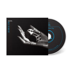 Music for Man Ray CD with black and white cover featuring hand holding two dice and blue text accents