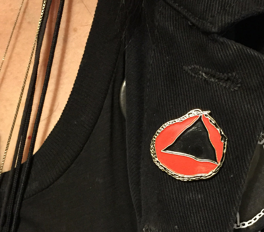 Dripper World Sacred Bones Logo Enamel Pin (Black on Red)