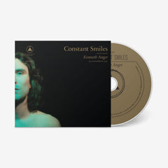 Kenneth Anger Constant Smiles CD cover with half face portrait and gold text on black background